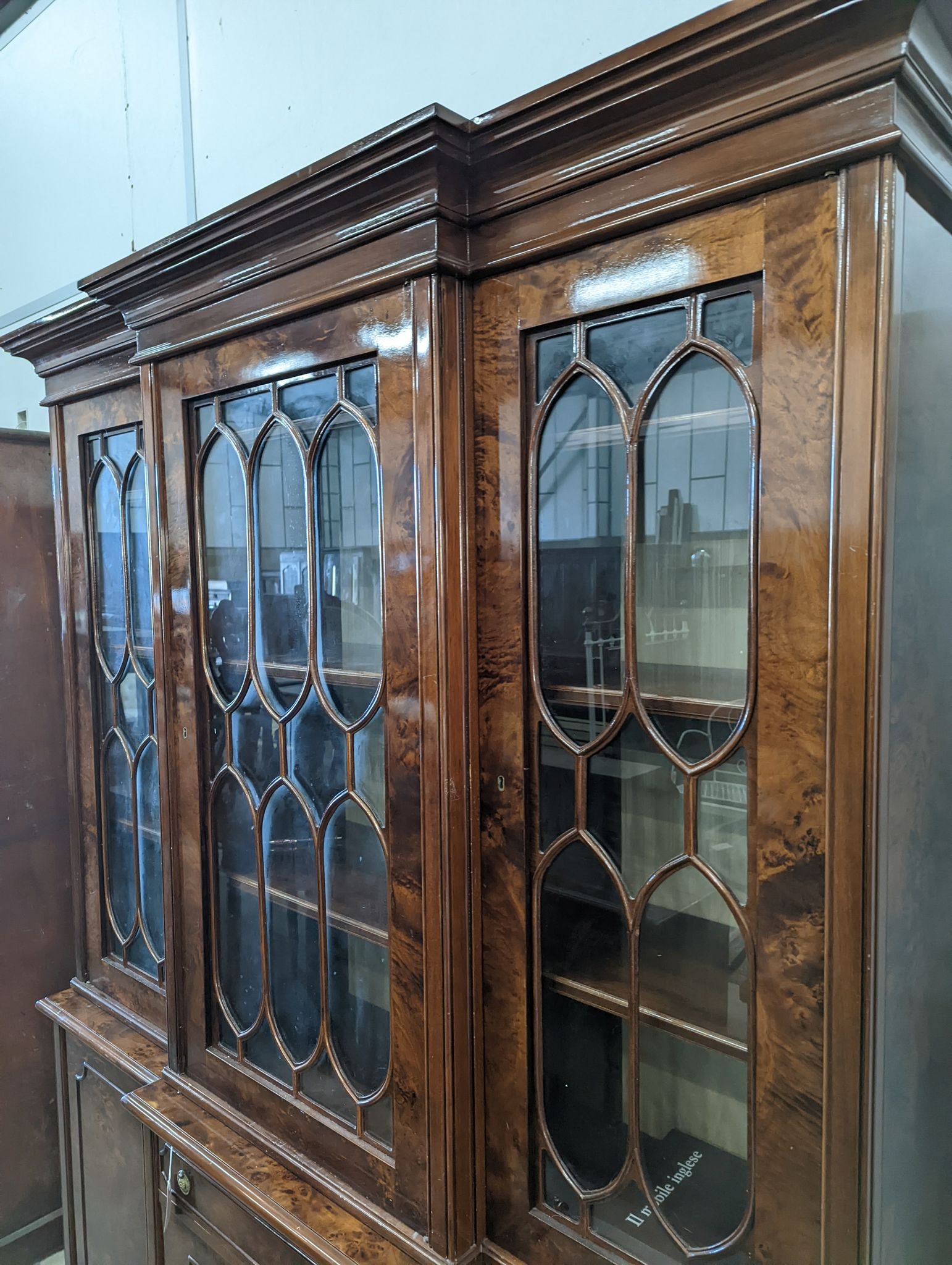 A Victorian style walnut breakfront library bookcase, length 168cm, depth 46cm, height 219cm